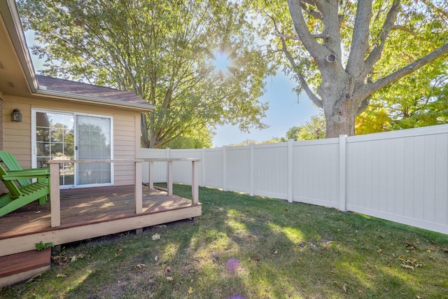 view of yard featuring a wooden deck