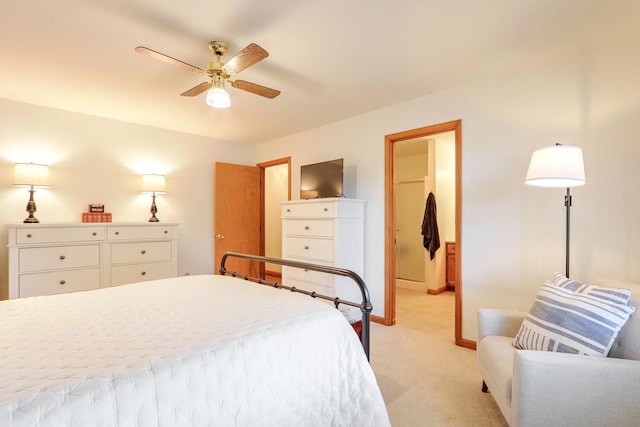 bedroom featuring light carpet and ceiling fan