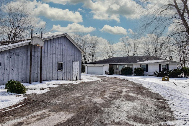 exterior space featuring a garage