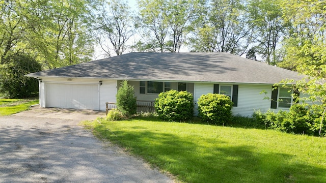 8 Fraher Dr, Odell, IL 60460 - single story home featuring driveway, an attached garage, a front yard, and a shingled roof