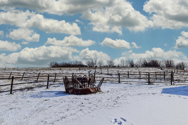 view of yard with a rural view