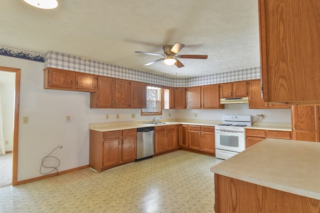 kitchen with dishwasher, sink, white range with gas cooktop, ceiling fan, and a textured ceiling