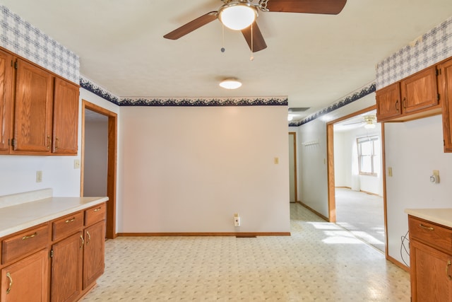 kitchen featuring ceiling fan