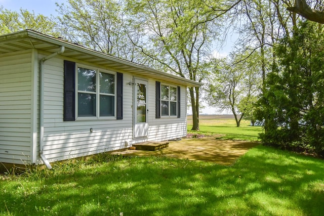 8 Fraher Dr, Odell, IL 60460 - view of home's exterior featuring a lawn
