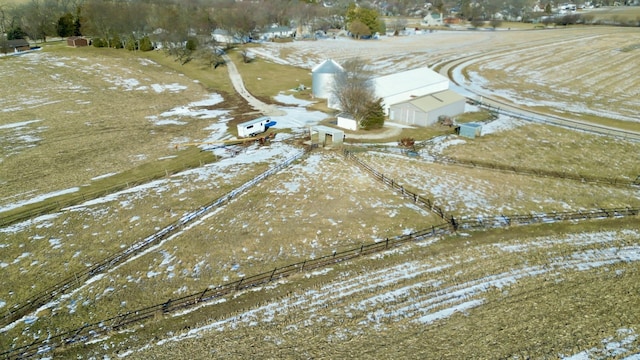 snowy aerial view with a rural view