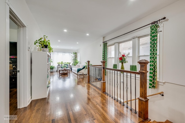 corridor featuring hardwood / wood-style flooring