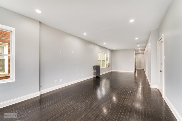 unfurnished room featuring dark hardwood / wood-style floors