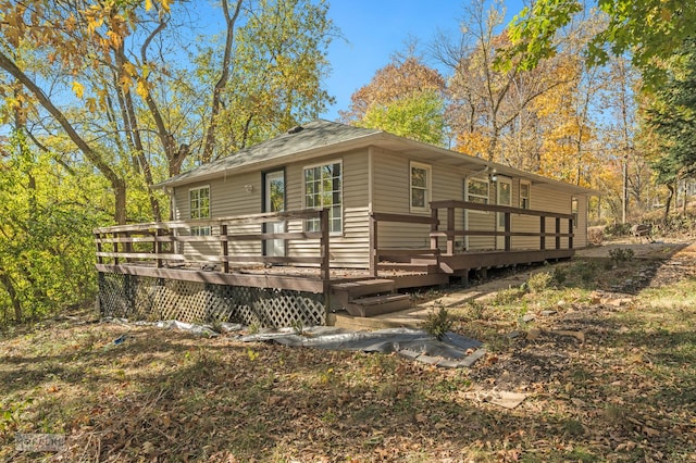 view of front of property featuring a wooden deck