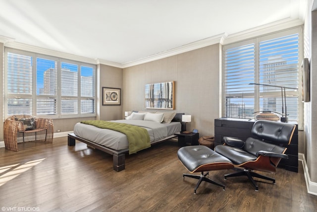 bedroom featuring dark hardwood / wood-style flooring and crown molding