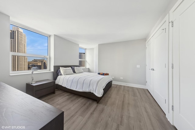 bedroom featuring light wood-type flooring