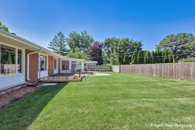 view of yard with a patio area