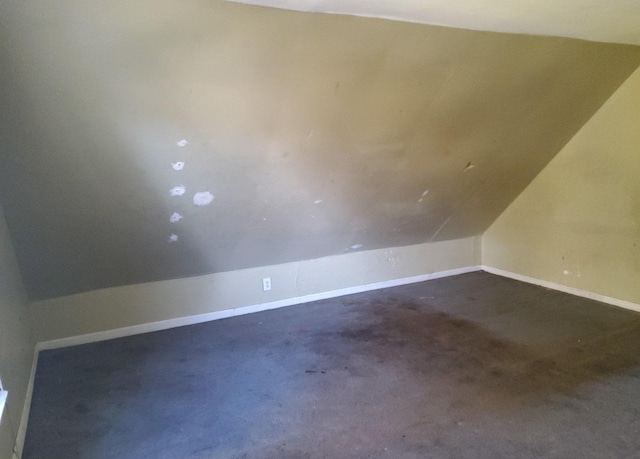 bonus room featuring lofted ceiling