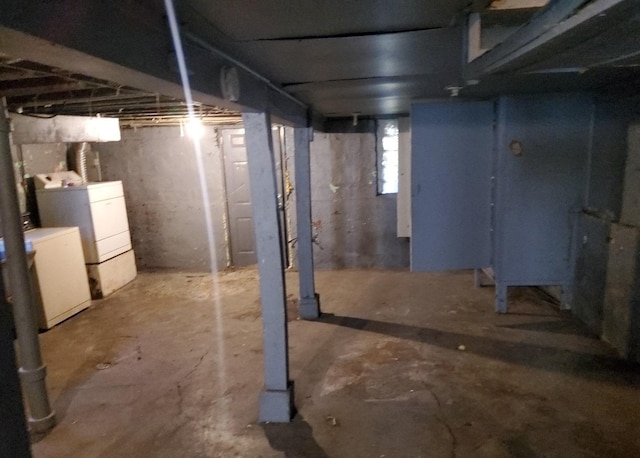 basement featuring separate washer and dryer