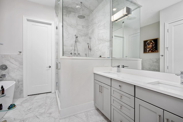 bathroom with shower with separate bathtub, vanity, and tile walls