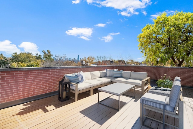 deck with an outdoor hangout area