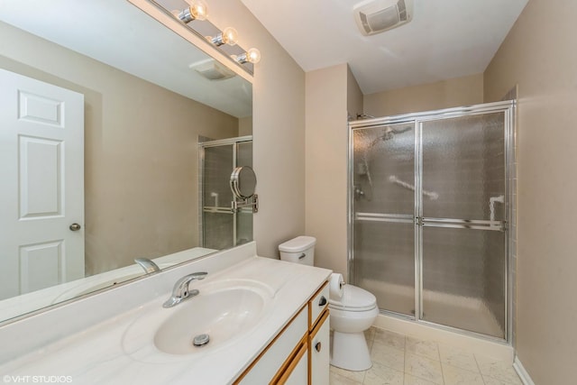 bathroom with toilet, an enclosed shower, and vanity