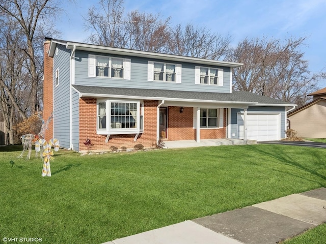 view of front of house with a front yard, a porch, and a garage