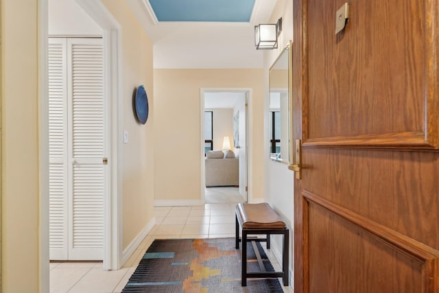 hall with light tile patterned flooring