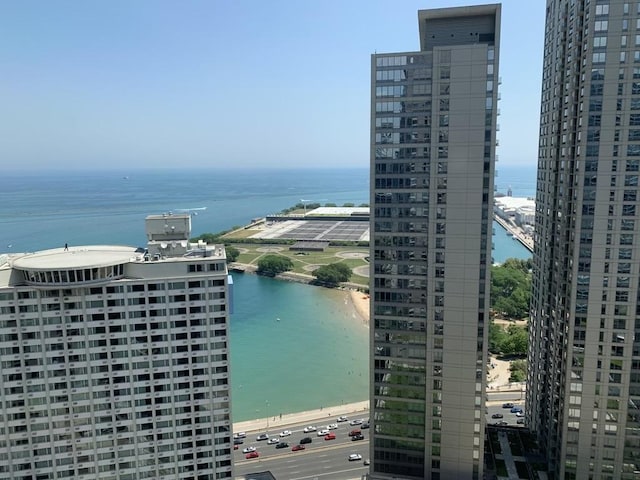 property view of water featuring a beach view