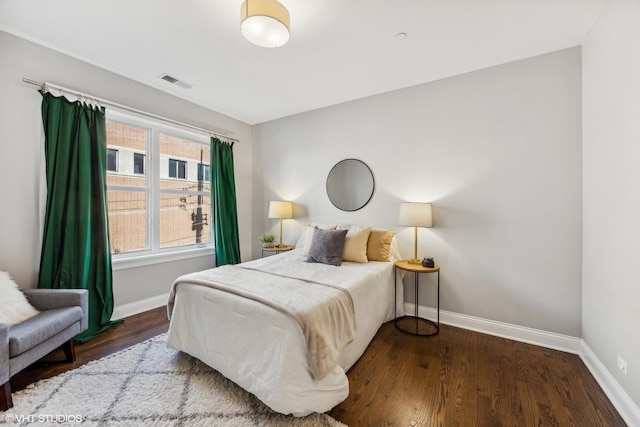 bedroom featuring hardwood / wood-style floors