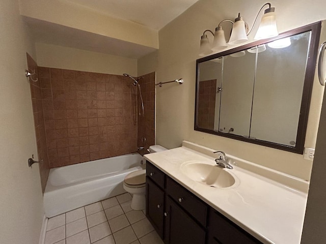 full bathroom featuring tile patterned flooring, vanity, tiled shower / bath combo, and toilet