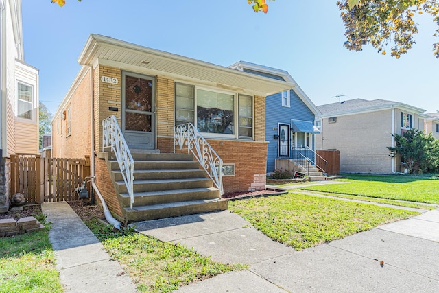 view of front of property with a front lawn