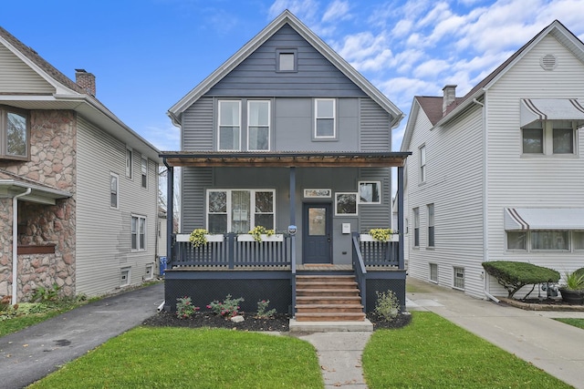 front facade featuring covered porch