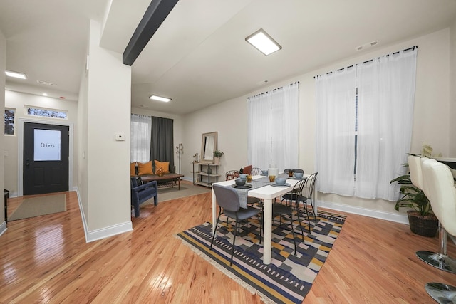 dining room with light wood-type flooring