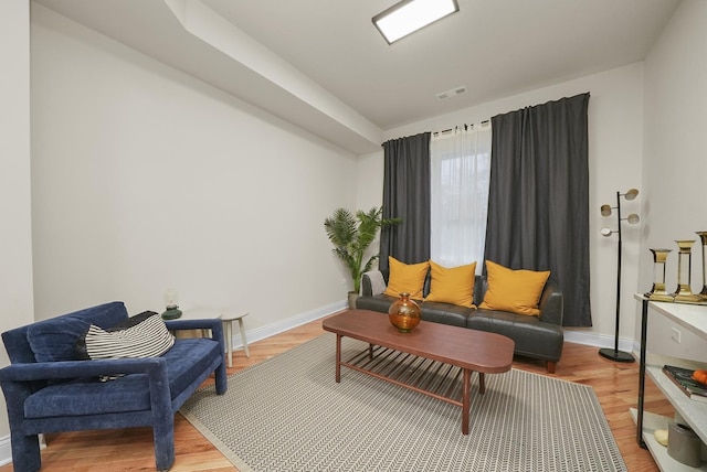 sitting room with light hardwood / wood-style floors