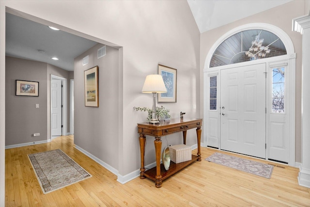 foyer with hardwood / wood-style flooring