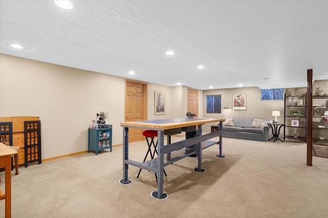 recreation room featuring light colored carpet