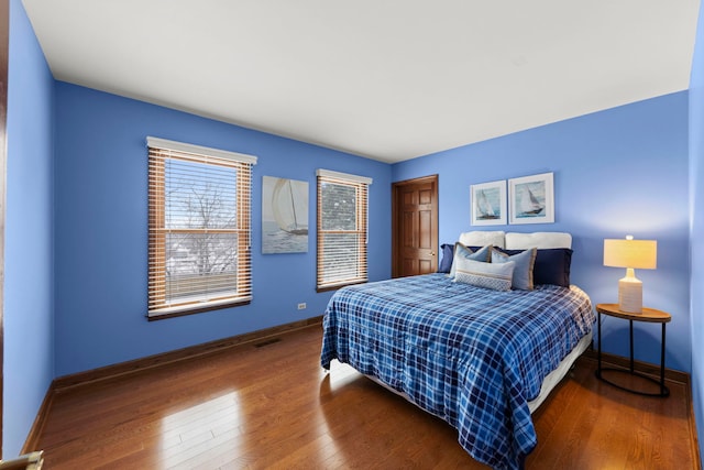 bedroom featuring dark hardwood / wood-style floors