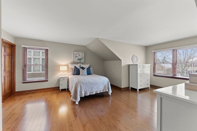 bedroom with wood-type flooring