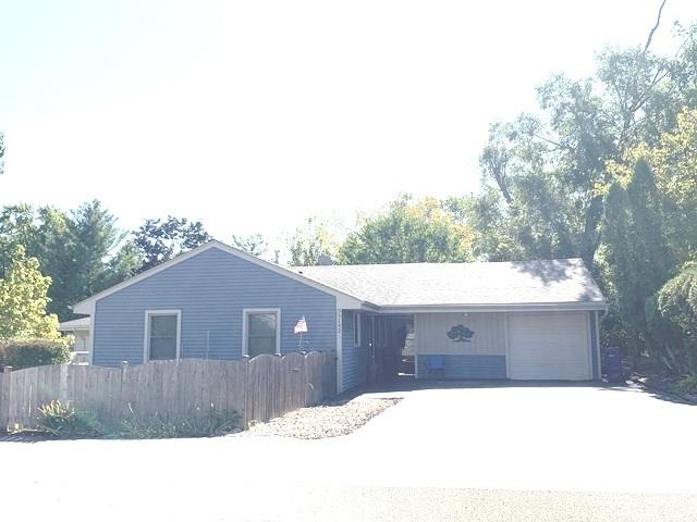 ranch-style home with a garage