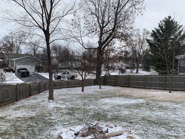 view of yard covered in snow