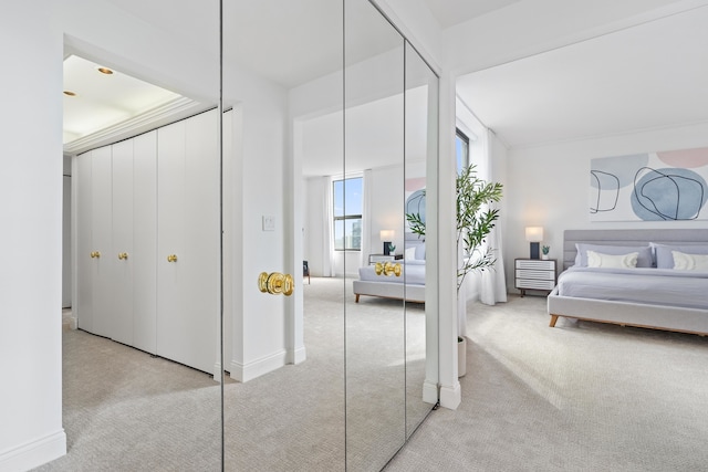 bedroom with light carpet