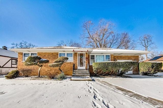 view of front of property with a carport