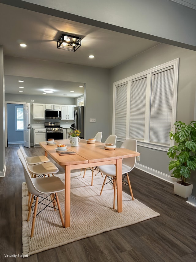 dining room featuring dark hardwood / wood-style floors