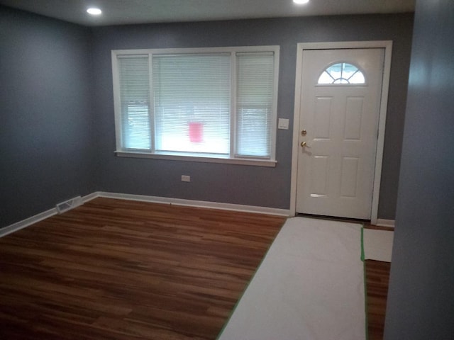 foyer with dark hardwood / wood-style flooring