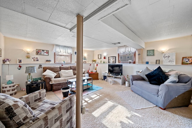 living room featuring carpet flooring and plenty of natural light