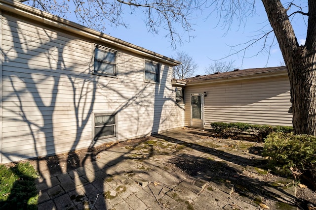 rear view of property with a patio area