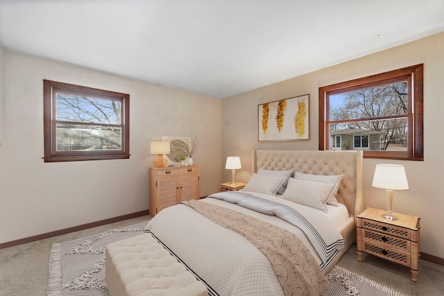 bedroom featuring carpet flooring and multiple windows