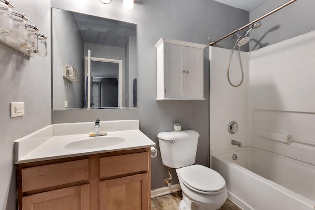 full bathroom featuring tile patterned floors, toilet, vanity, and washtub / shower combination