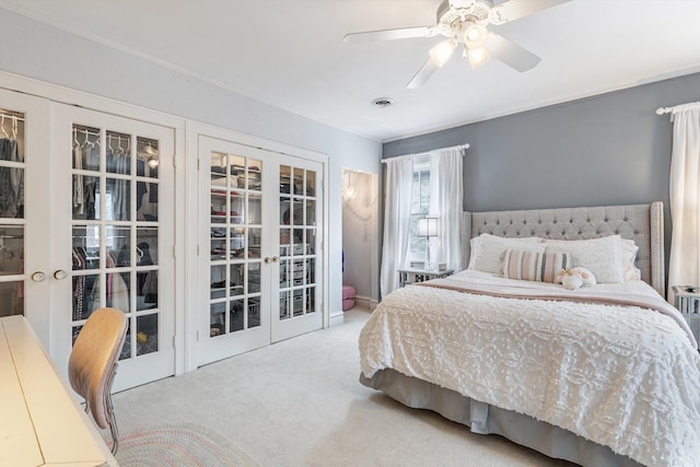 carpeted bedroom featuring ceiling fan and french doors