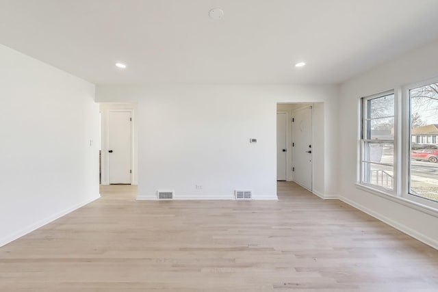 empty room with light wood-type flooring