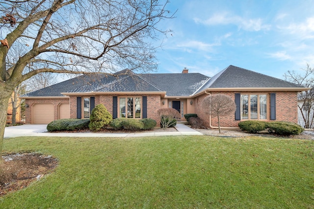 ranch-style house with a front yard and a garage