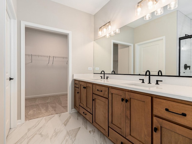 bathroom with an enclosed shower and vanity