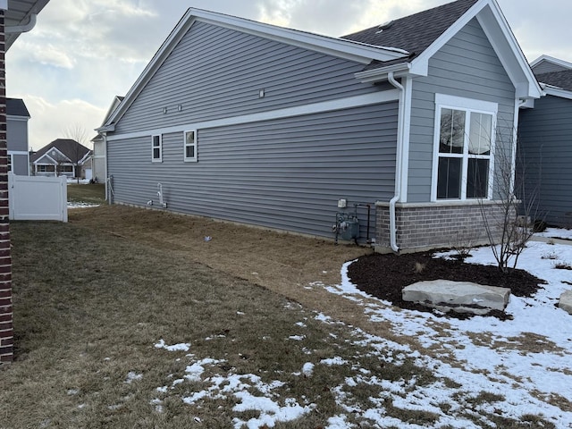 view of snow covered property