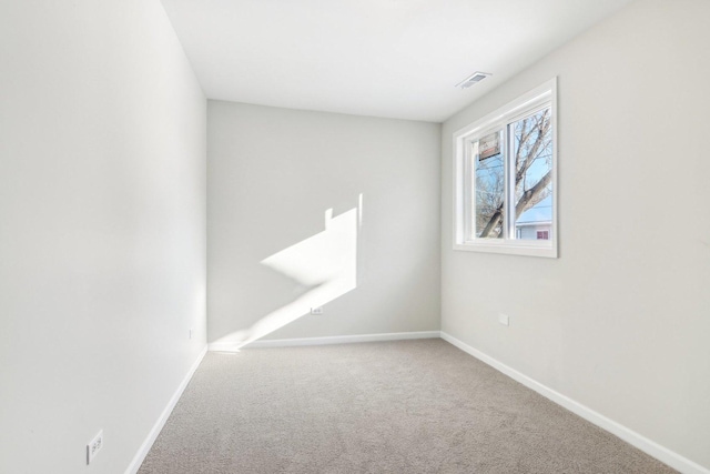 view of carpeted spare room