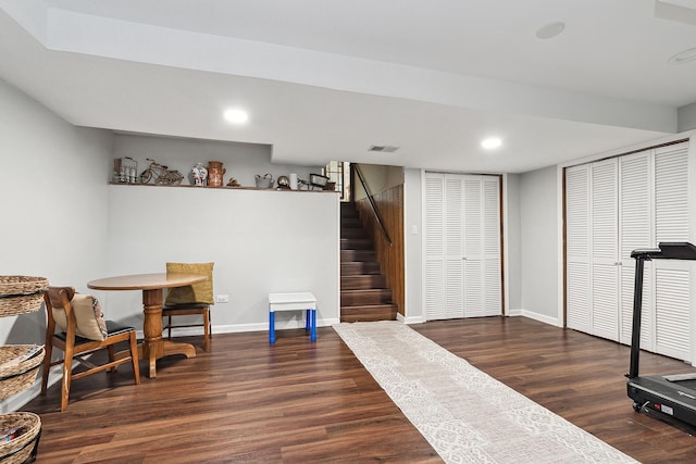 sitting room with dark hardwood / wood-style flooring